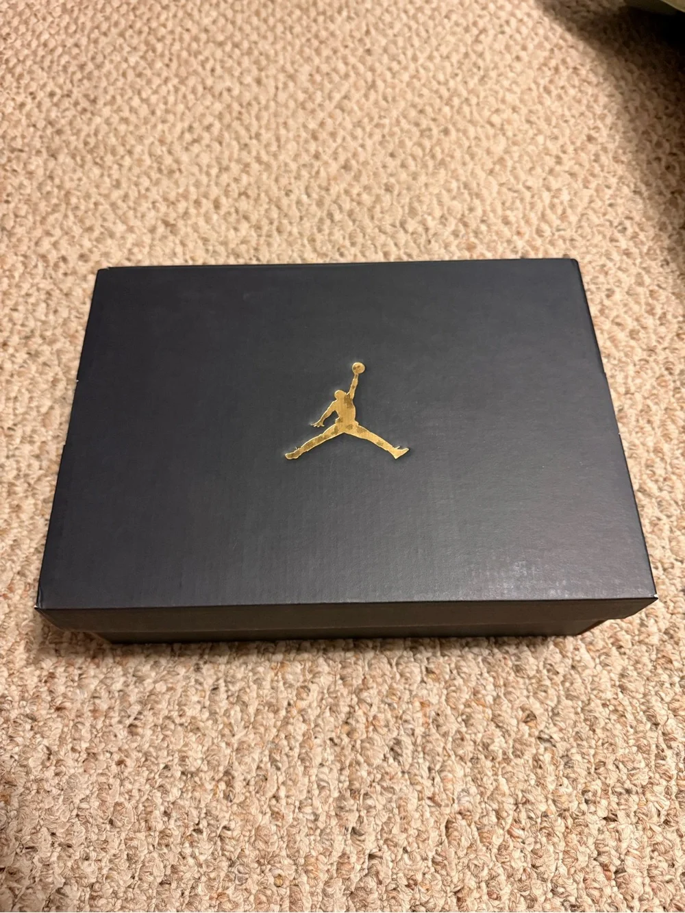 Nike Men’s Jordan Air 1 Black and Red Low-Top Sneakers